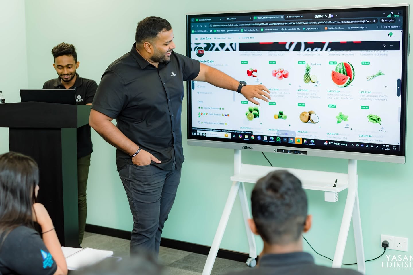 Presenter explaining a strategy board to a seated team