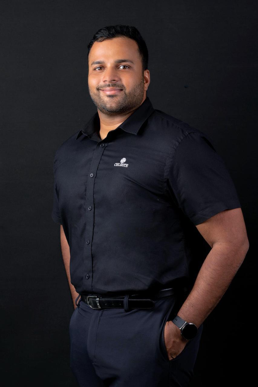 Janik Jayasuriya in an executive portrait representing leadership and future business growth